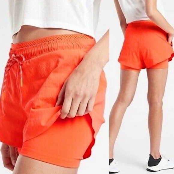 Athleta Trekkie Crest 2 in 1 Shortie in Racing Red Athletic Ripstop Neon Shorts - Picture 2 of 10